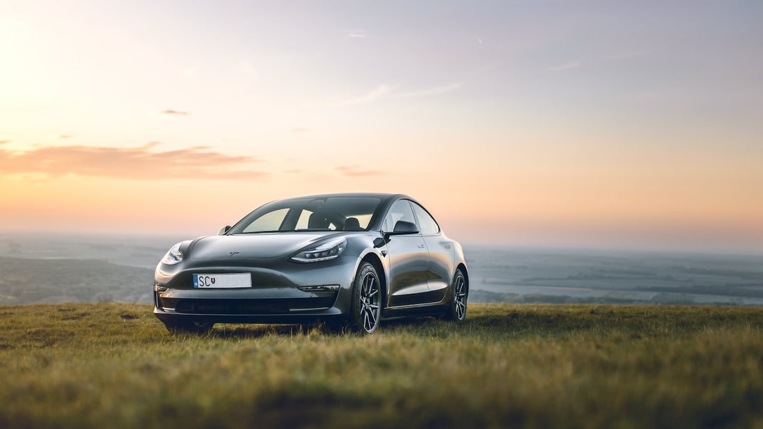 Tesla Model 3 at sunset