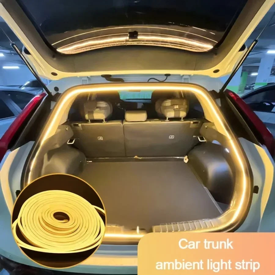 Car trunk with ambient LED light strip glowing warm white, enhancing interior illumination and style