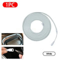 White LED strip light with DC connector, coiled for car interior lighting installation