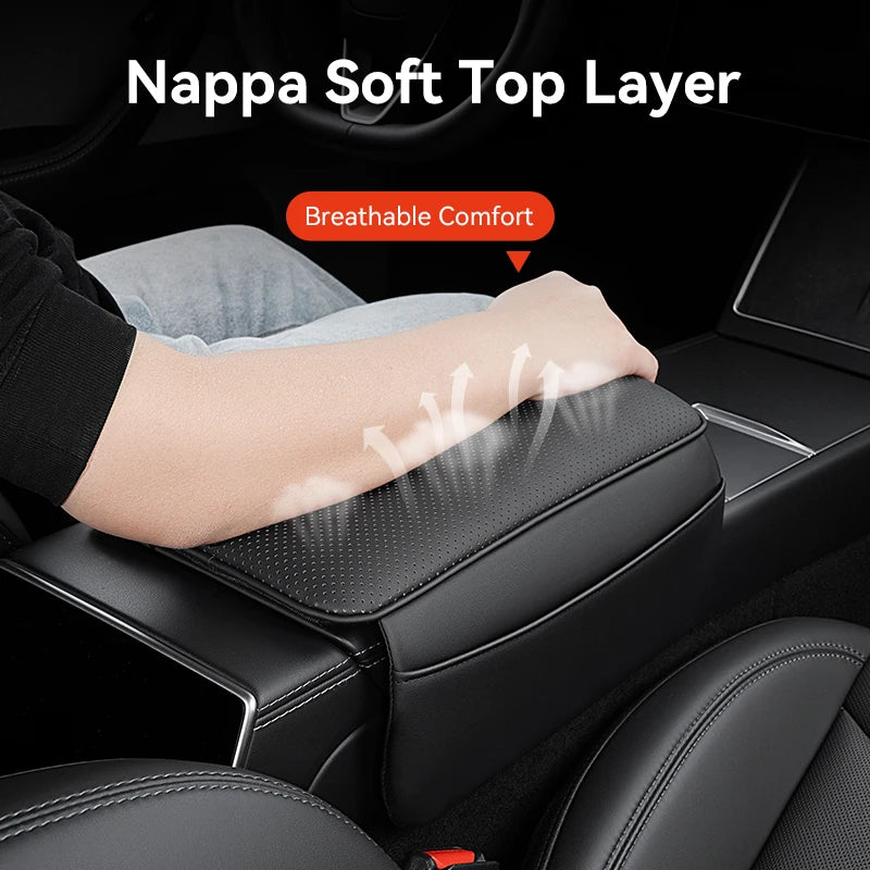 Hand resting on Nappa soft top layer Tesla armrest console cover