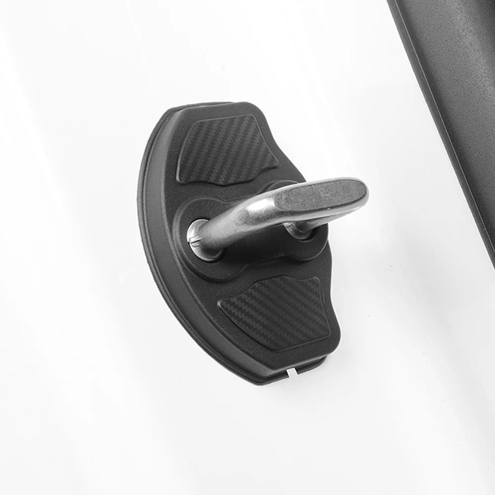 Tesla door lock protector cover fitted over latch striker