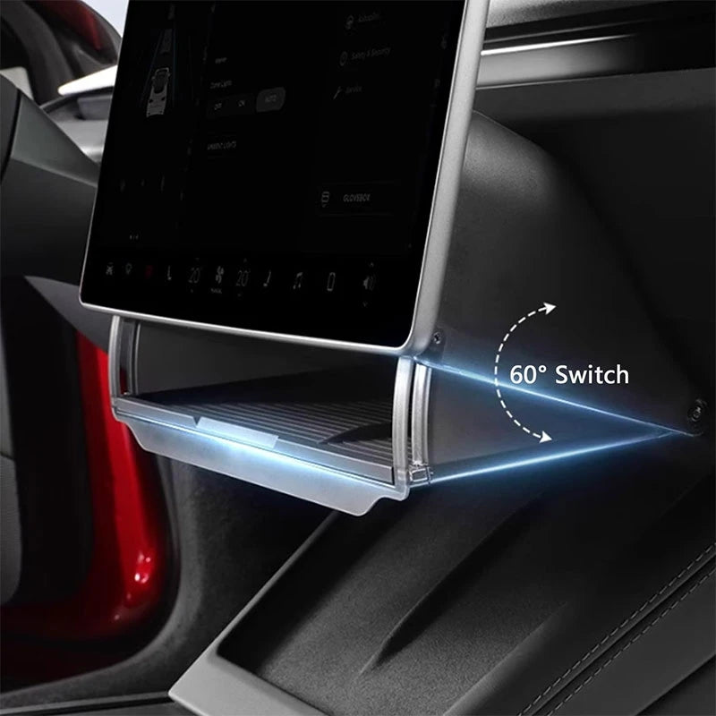Tesla under-screen retractable storage tray pulled out behind center display