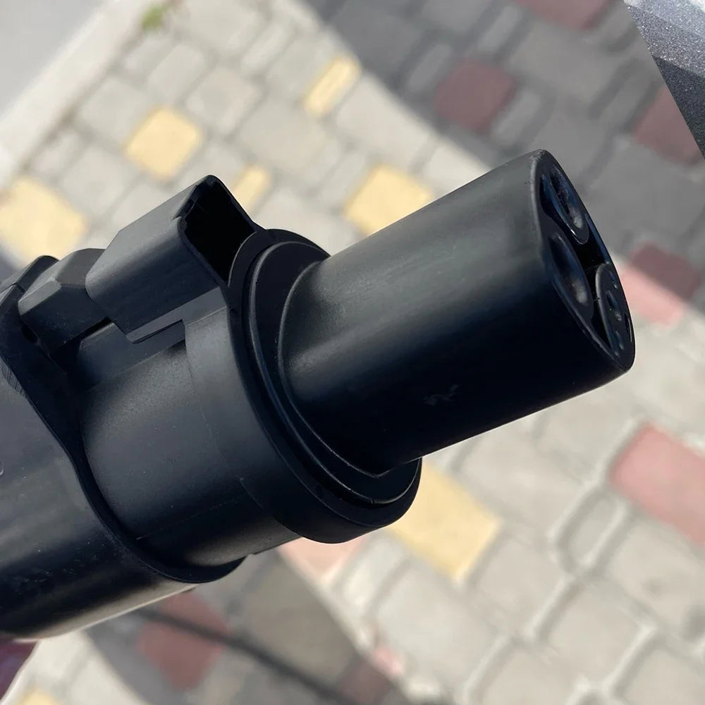 J1772 to Tesla charging adapter connector close-up