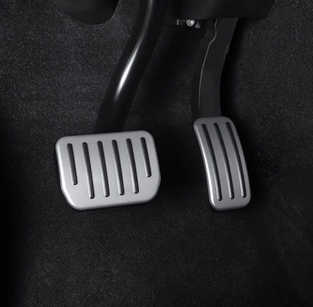 Tesla aluminum performance pedals installed in footwell