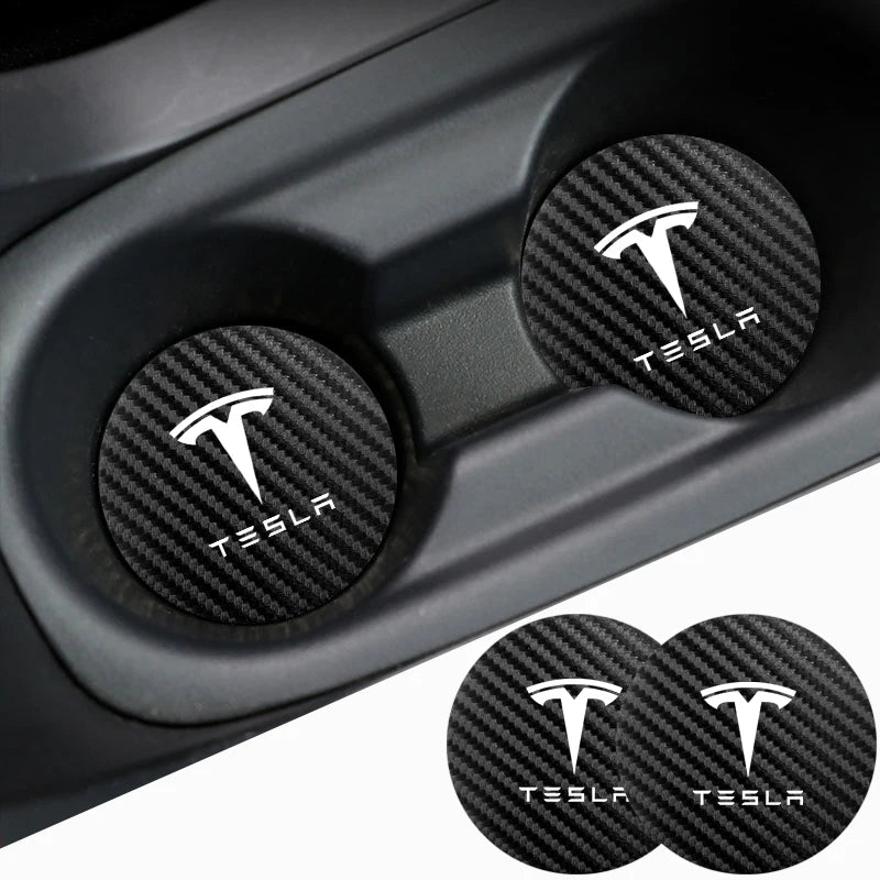 Tesla cup holder coasters installed in a vehicle cup holder