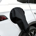 Black magnetic EV charge port cover installed over a connector on a white car