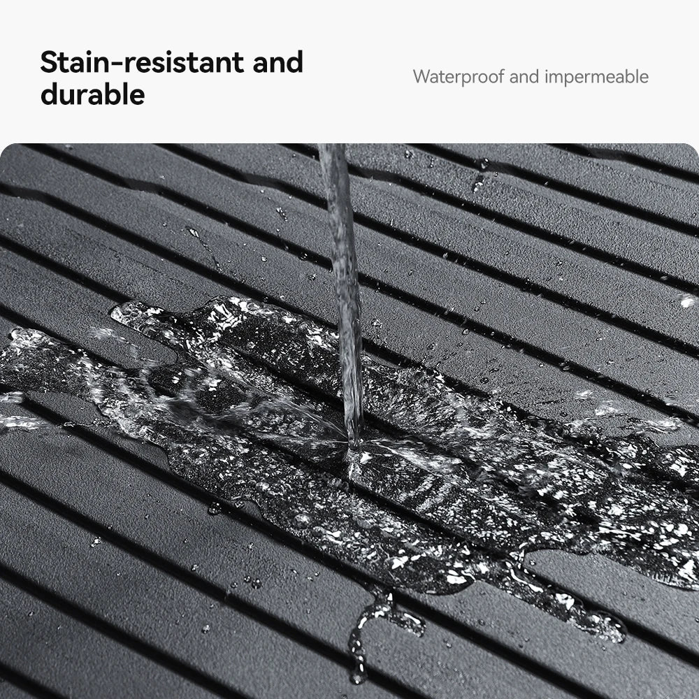 Water beading on the stain-resistant waterproof TPE Tesla floor mat surface