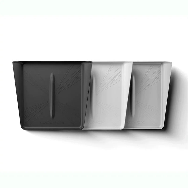 Three color options of Tesla Model Y Juniper under-screen storage tray