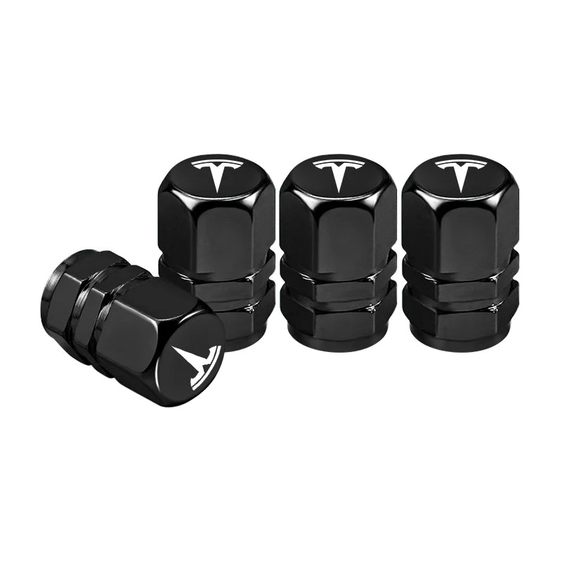 Black metal Tesla tire valve stem caps