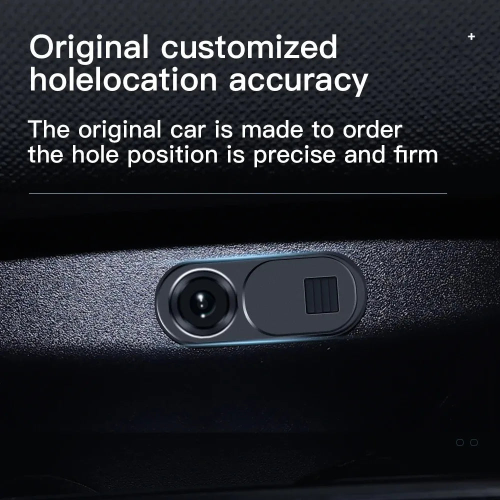 Camera privacy cover installed over Tesla cabin camera lens