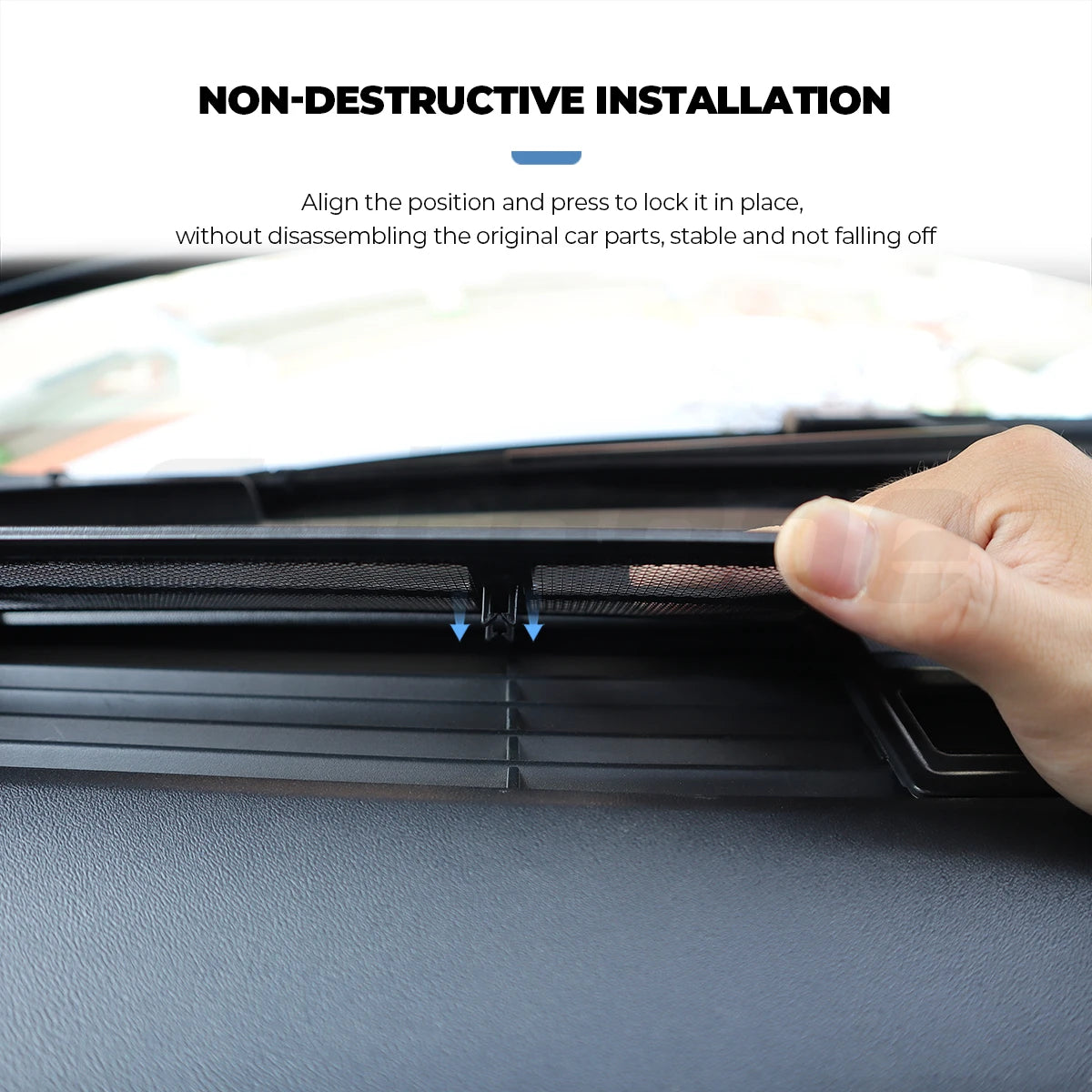 Hand pressing air inlet mesh cover into place during non-destructive install