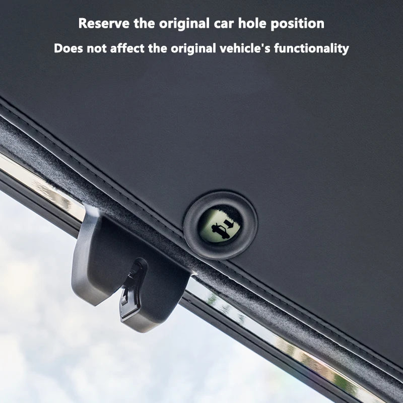 Reserved hole position keeps original Tesla trunk hardware accessible