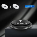 Black Tesla air freshener diffuser with two scented refill tablets