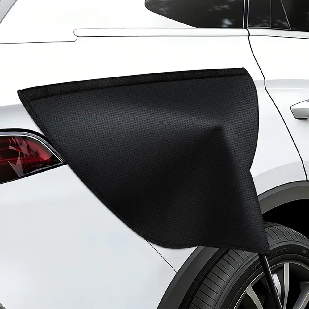 Magnetic EV charging cover draped over the charge port on a white vehicle