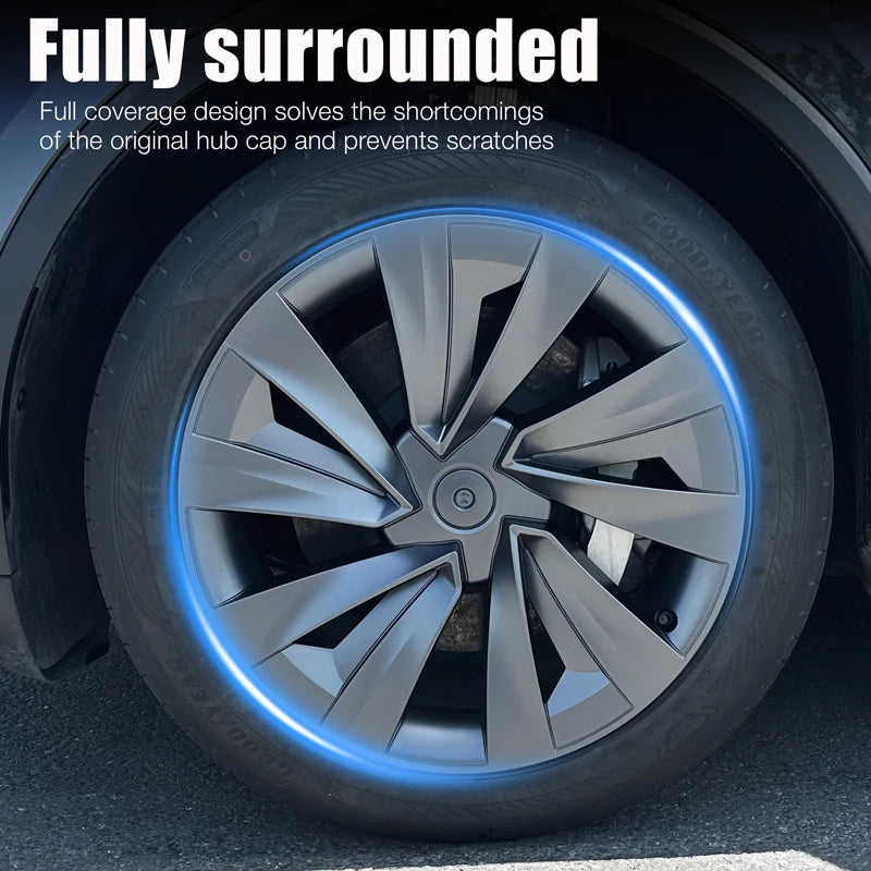 Close-up of fully surrounded crossflow wheel cover on Tesla Model Y rim