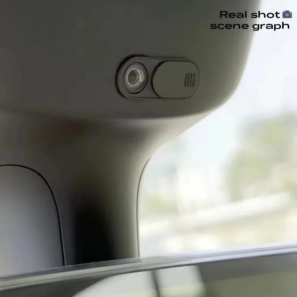 Real-shot view of privacy cover mounted by the Tesla rearview area