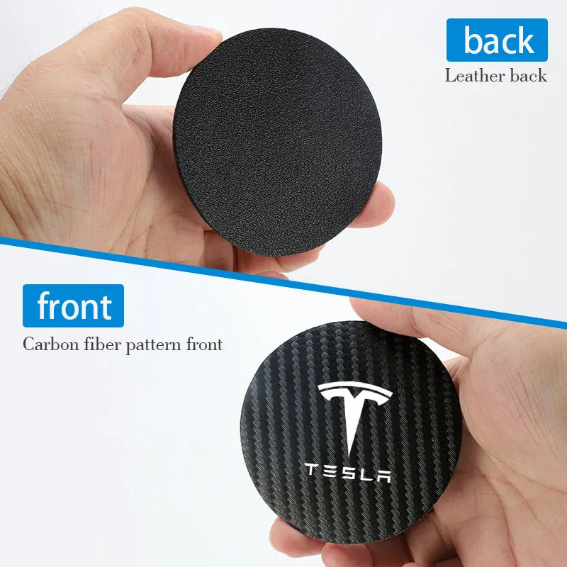 Front carbon-fiber and back leather-style sides of the Tesla coaster