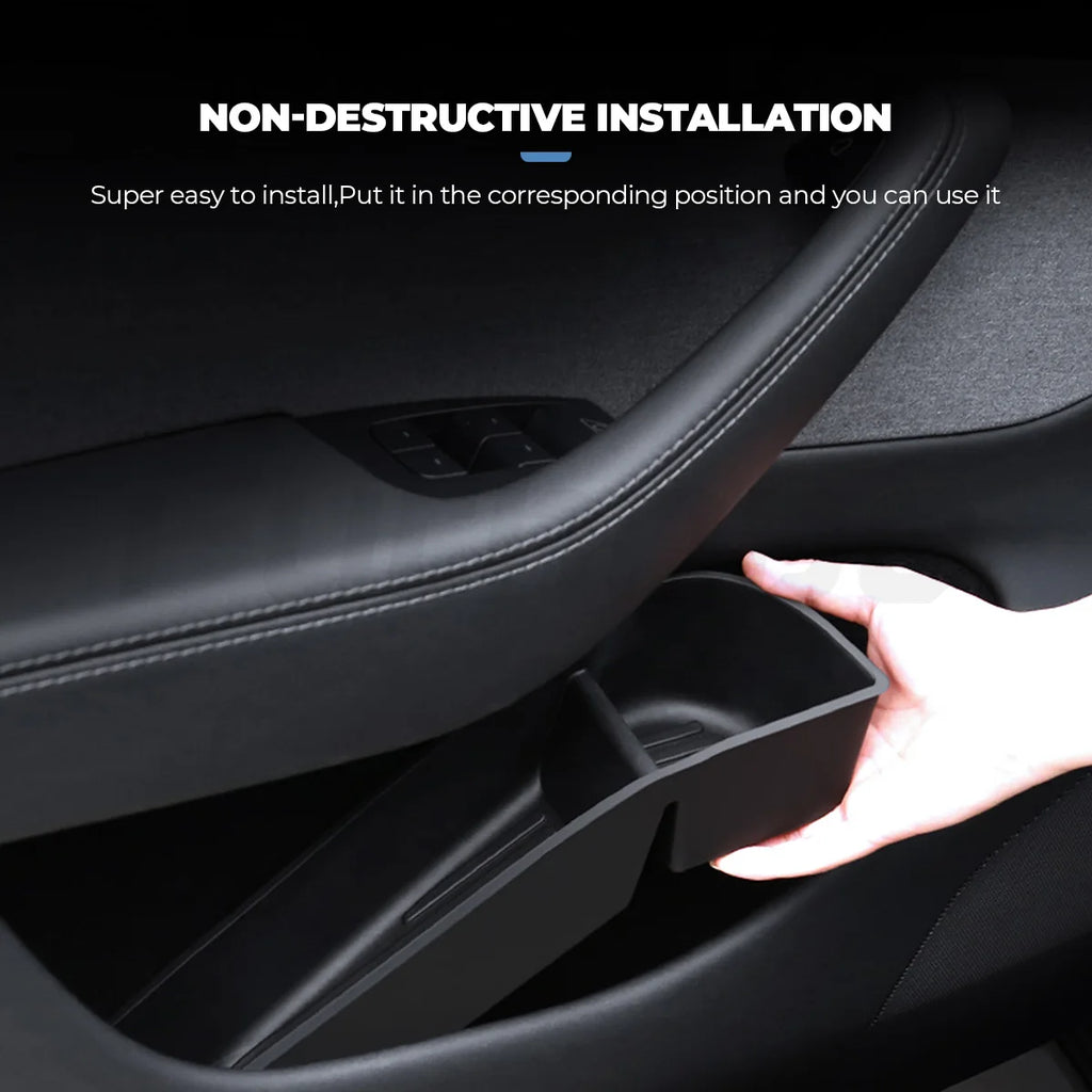 Tesla Model Y Juniper door side storage tray installed behind the front door handle