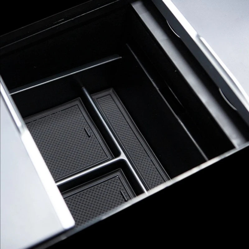 Center console armrest storage box installed in Tesla