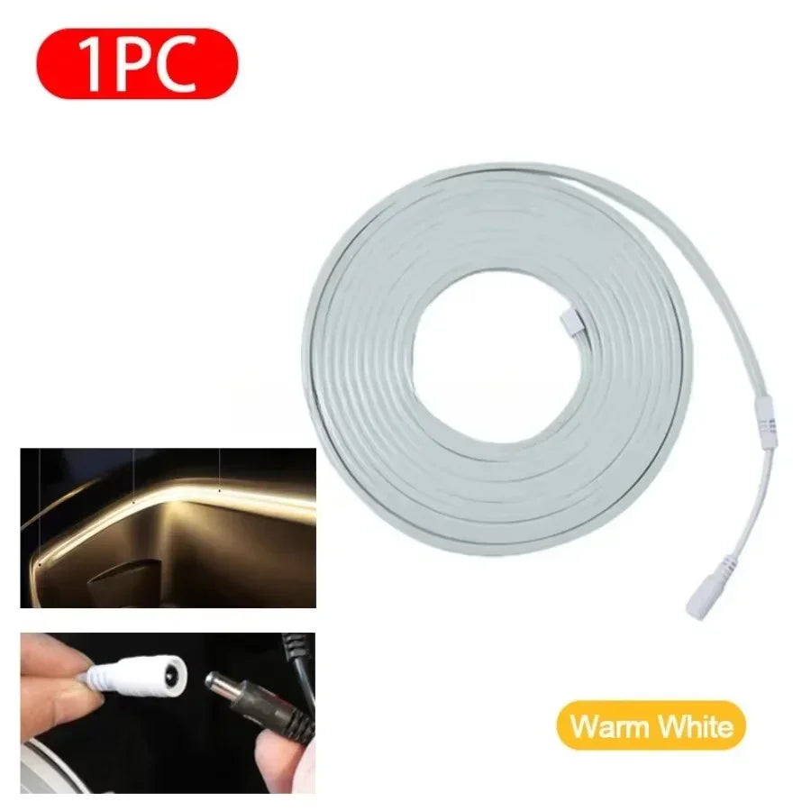 Warm white LED strip light, flexible design with DC connector, ideal for ambient lighting